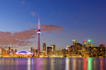 Cityscape of Toronto, Canada at dusk, looking towards CN Tower and downtown