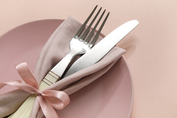 Stylish table setting on pink background