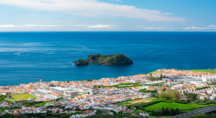Naklejka premium Town and islet of Vila Franca do Campo. Sao Miguel island. Azores, Portugal. No ads or branding.