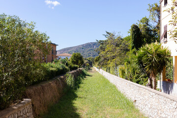 High water channel in Marina di Campo on the island of Elba in Italy in summer with blue sky