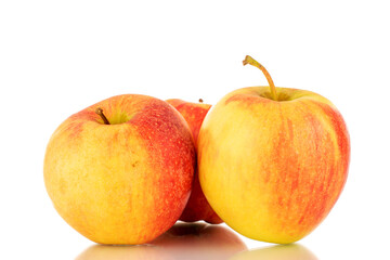 Three red juicy apples, macro, isolated on white.