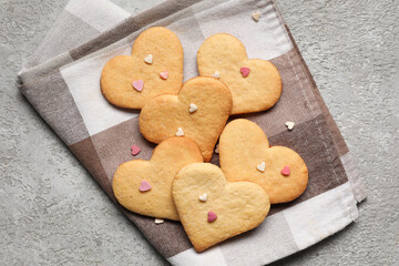 Tasty heart shaped cookies on grey background. Valentines Day celebration