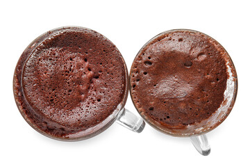 Glass cups with tasty chocolate brownie on white background