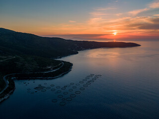 Aerial  view of beautiful sunset in kassiopi north corfu greece