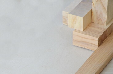 Wooden boards on a light background. In the center is an empty space for text. Natural building materials. Background.