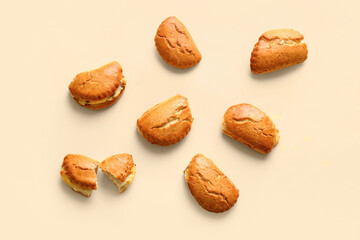 Tasty sochniki with cottage cheese on beige background