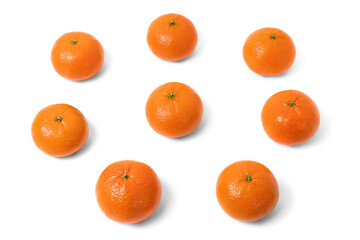 Ripe juicy Moroccan tangerines on a white background