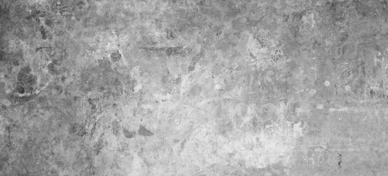 Old gray grey white vintage shabby patchwork motif tiles stone concrete cement wall texture background.