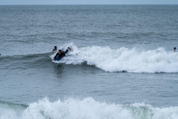Bodyboarder performing a 360 trick