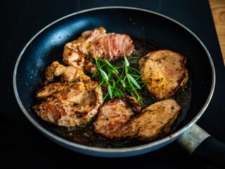 Fototapeta premium Pork nuggets in frying pan 