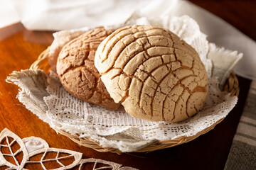 Conchas. Mexican sweet bread roll with seashell-like appearance, Usually eaten with coffee or hot chocolate at breakfast or as an afternoon snack.