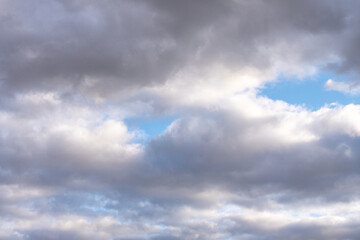 blue sky with dark clouds