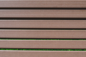 Closeup, texture background of wooden slats. Lattice made of natural wood.