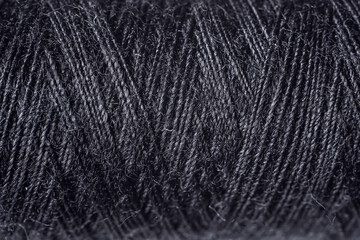 Black sewing threads as background