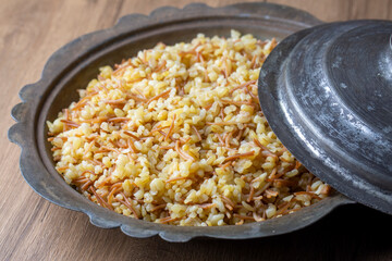 Traditional delicious Turkish food; Bulgur pilaf with vermicelli (Turkish name; sehriyeli bulgur pilaf)