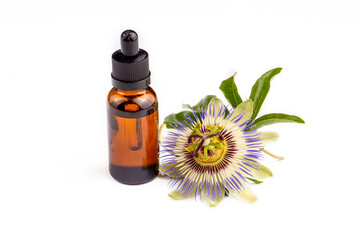 Passiflora incarnata plant and Passiflora essential oil, relaxing oil on the white background