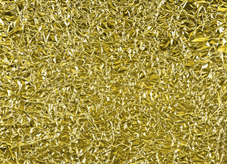 Zerknitterte goldene Aluminiumfolie als Hintergrund