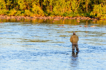fly fisherman in the river
