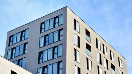  Facade of a modern apartment condominium in a sunny day