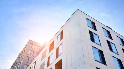  Facade of a modern apartment condominium in a sunny day - obrazy, fototapety, plakaty
