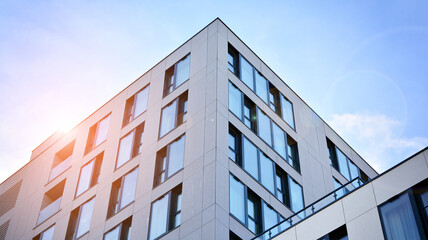  Facade of a modern apartment condominium in a sunny day - obrazy, fototapety, plakaty