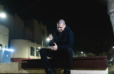 A man disappointed when he saw his food outside at night