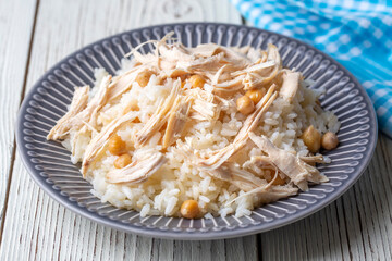 Traditional delicious Turkish food; Rice with chickpeas and chicken (Turkish name; Tavuklu nohutlu pilav or pilaf)