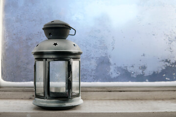 lantern for wooden window sill frozen winter window