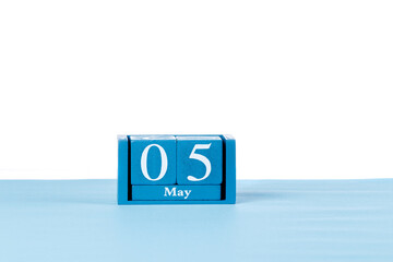 Wooden calendar May 05 on a white background
