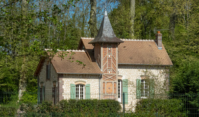 Fototapeta na wymiar Beautiful French house tucked away deep in the woods