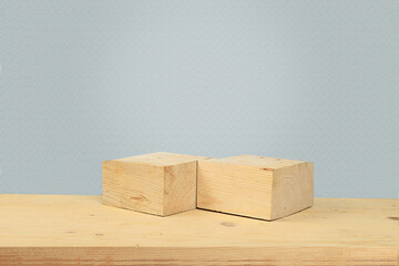Abstract background with natural wood podiums and old gray texture wall, empty showcase for...