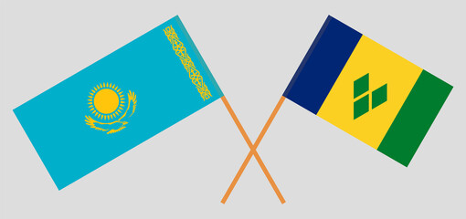 Crossed flags of Kazakhstan and Saint Vincent and the Grenadines. Official colors. Correct proportion