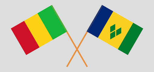 Crossed flags of Mali and Saint Vincent and the Grenadines. Official colors. Correct proportion