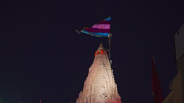 Night view of beautiful Dwarka temple with flag on top At Dwarka, Gujarat, India. Sacred pilgrimage of Hindus in India