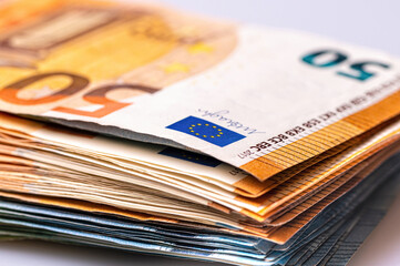 fifty and twenty euro banknotes close-up. Cash background