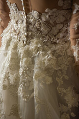 Elements of tailoring evening dress on the model