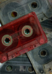Vintage audio cassette tapes placed next to each other. Obsolete technology of audio recording and...