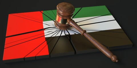 Broken block with flag of the UAE and judge's gavel. Conceptual 3d rendering
