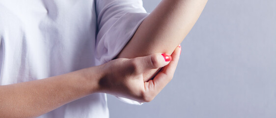 a young girl's arm hurts