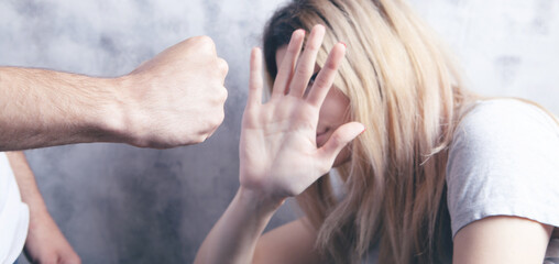 the husband wants to hit his wife. domestic violence