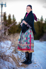 Young beautiful slovak woman in traditional dress. Slovak folklore