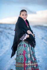 Young beautiful slovak woman in traditional dress. Slovak folklore