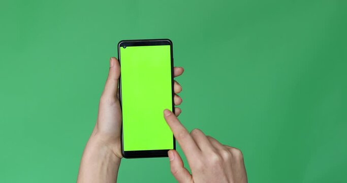 woman holding smart phone for qr code reader