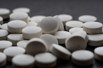 Fototapeta na wymiar A pile of Vitamin D pills