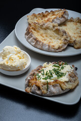 Traditional Finnish foods - Fresh Karelian pies with rice pudding filling and egg butter and chives...