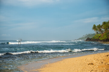 Fototapeta na wymiar waves on the beach sri lanka indian ocean