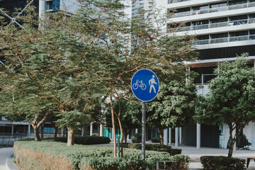Outdoor direction sign board for people in a park area on the street