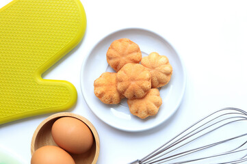 Thai dessert mini castella cake, Thai sweet dessert made with egg and sugar baked in aluminium moulds also called khanom khai.