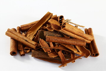 cinnamon stick bark in white background with copy space