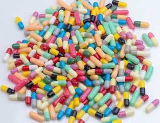 colorful pills on white background